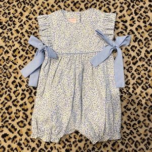 Petit bebe jumper. With ruffle and blue gingham bow